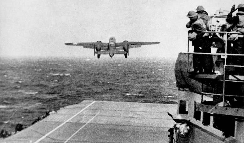 A US Army Air Corps B-25 Mitchell takes off from the deck of USS Hornet, part of the first air attack of WWII against the Japanese homeland (US Navy)